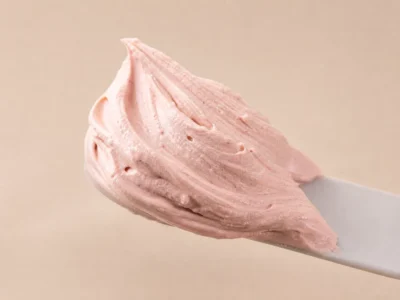 Close-up of whipped kaolin clay mask texture with red bean powder